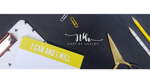 Black leather desk banner with pops of yellow