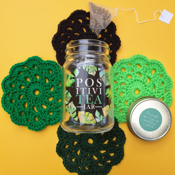 "PositiviTEA" jar with crochet coasters - black/greens
